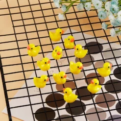 100 Pieces Mini Resin Duck Charms Miniature Duck Figures Tiny Duck Ornament Micro Fairy Garden Landscape Aquarium Dollhouse Decor For Christmas Accessories (Yellow) -Xmas Mart Sales 81k77tmGbIS. AC SL1500